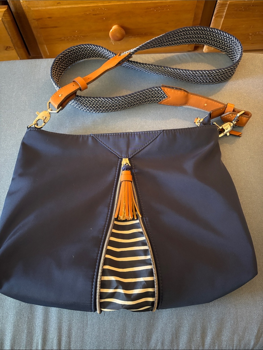 Stella & Dot Navy Crossbody with Tan faux leather Trim and Tassel